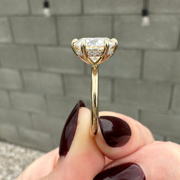 Thin gold band with 2025 solitaire diamond