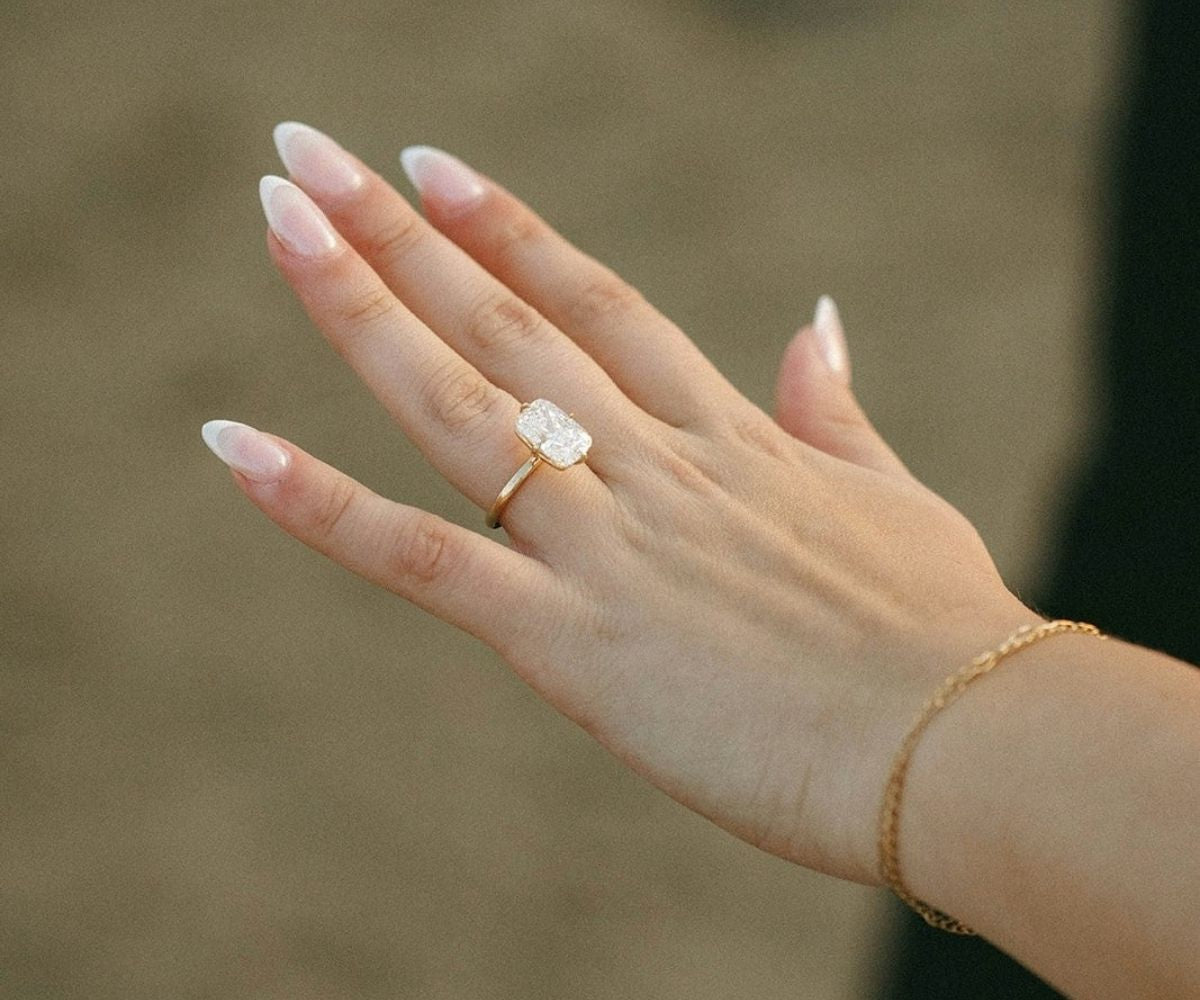 TOVAA Emerald Cut Moissanite Engagement Ring Solitaire 14k Yellow Gold Band On Hand