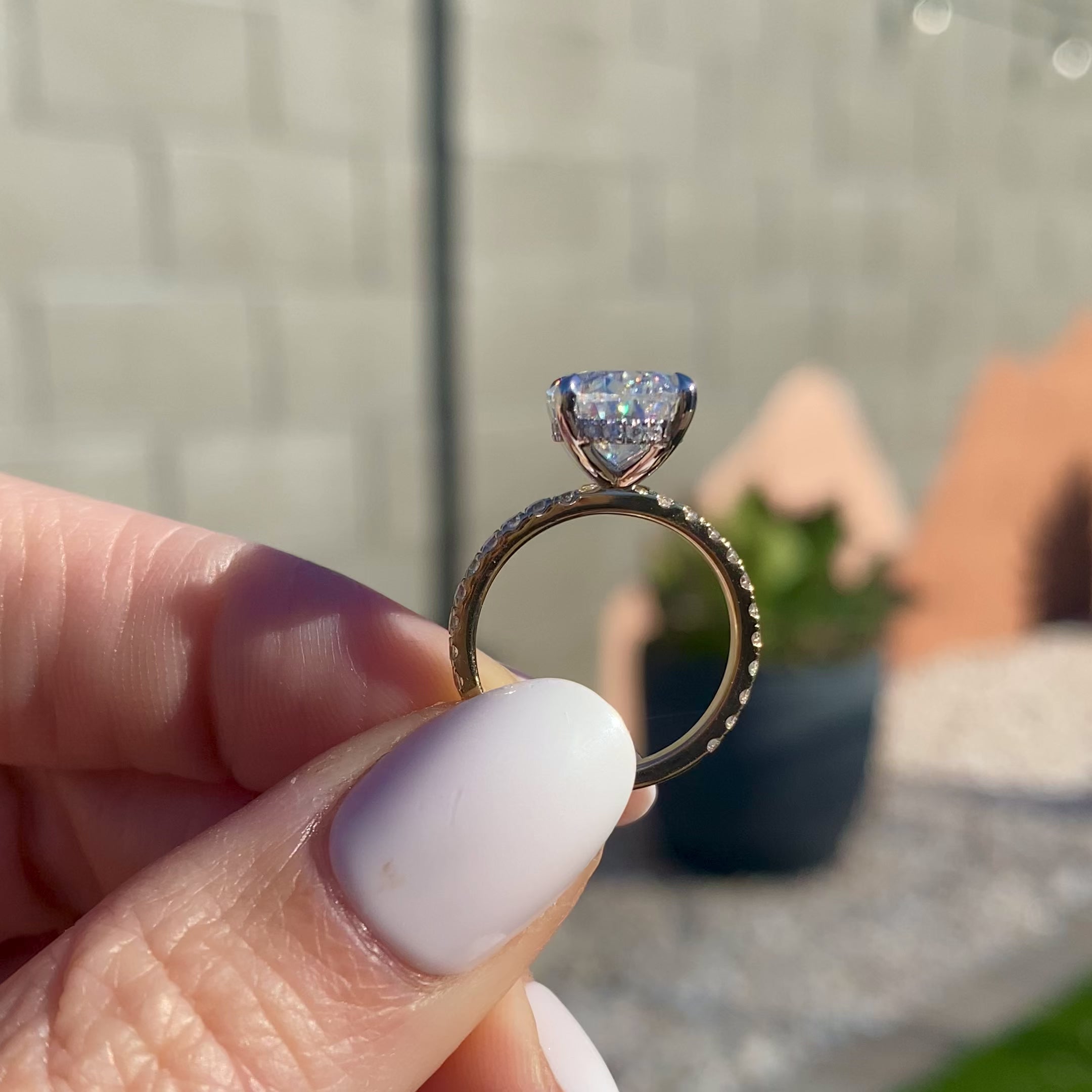 Olivia 4.7 Carat Oval Moissanite Solitaire Engagement Ring with 2-Tone 14k White and Yellow Gold Pavé Setting & Hidden Halo