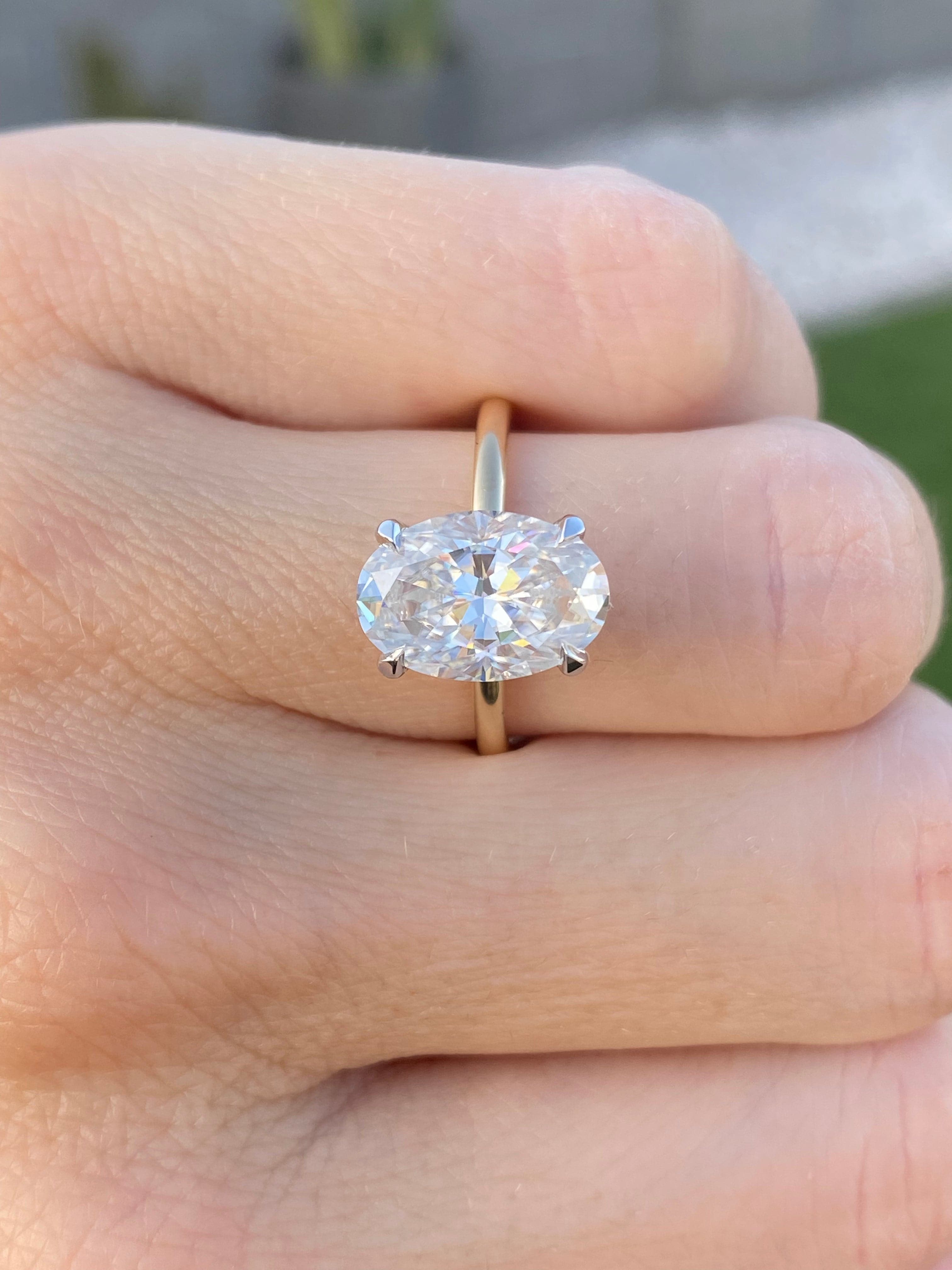 Olivia Flush 4 Carat Oval Moissanite Engagement Ring w/ 2-tone 14k white and yellow gold setting & Hidden Halo