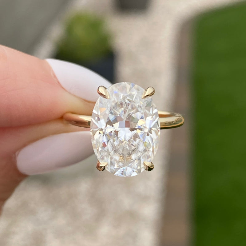 Gold oval hot sale diamond ring