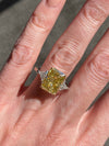 Trinity 3 Stone Moissanite Ring w/ 6.2 Carat Radiant Yellow Moissanite, Colorless Triangle Side stones, and 18K White & Yellow Gold Setting 